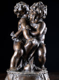 After Jean Baptiste Pigalle (1714–1785) - Eros and Anteros Fighting Over Heart - Harrington Antiques
