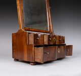 George I Walnut Swing Mirror With Four Serpentine Drawers, c.1720. - Harrington Antiques