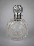 Large Sterling Silver & Cut Glass Scent Bottle by Cornelius Desormeaux, London, 1900. - Harrington Antiques
