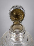 Large Sterling Silver & Cut Glass Scent Bottle by Cornelius Desormeaux, London, 1900. - Harrington Antiques