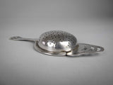 Sterling Silver Tea Strainer by Angora Silver Plate Co, Birmingham, 1932. - Harrington Antiques